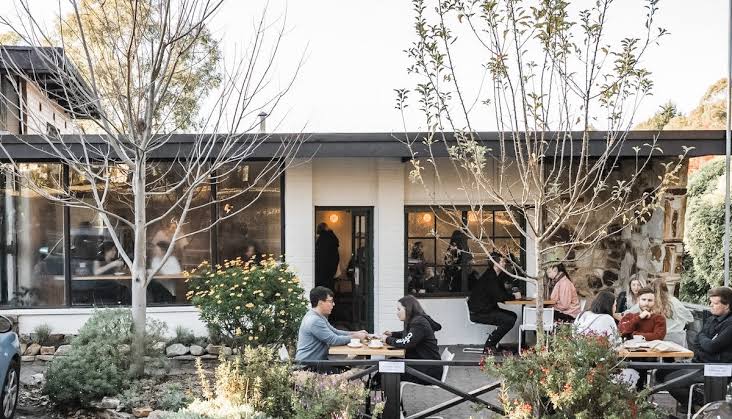 Cafe window with a view over hill country